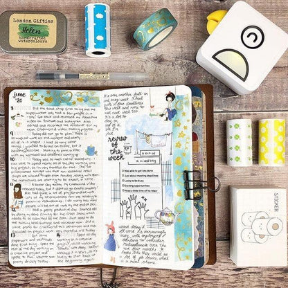 Belro pocket inkless printer, compact electronic device with sleek design, shown with printed photos on its surface.