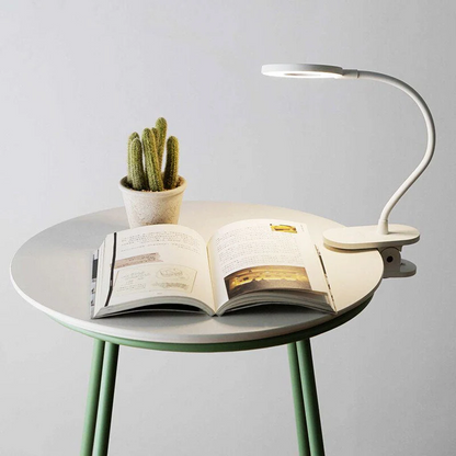 Belro wireless clip desk lamp with adjustable arm and LED light, suitable for home and outdoor use on tables and workspaces.