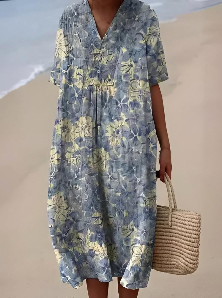 Belro summer dress featuring a flowy fabric, sleeveless design, and floral pattern ideal for warm weather wear.