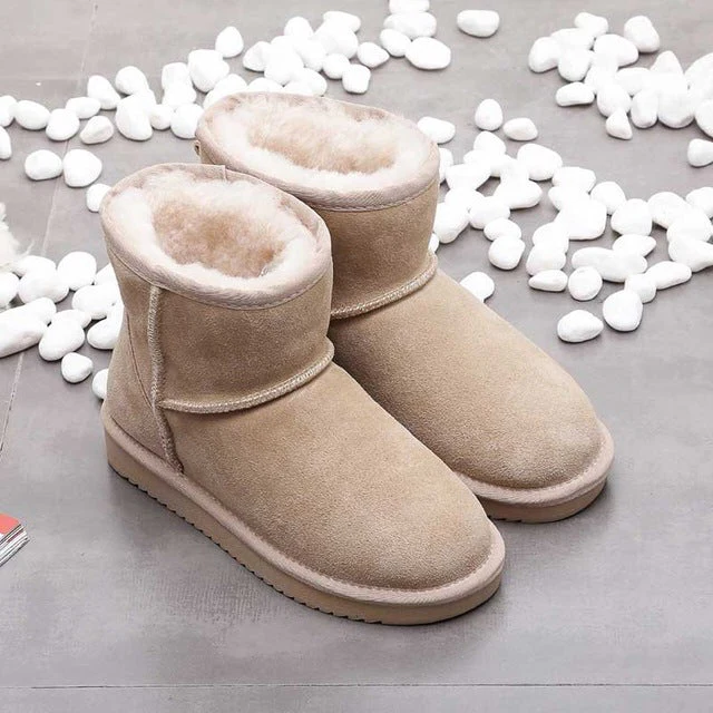Belro ankle snow boots showcasing waterproof material, sturdy soles, and stylish winter footwear for cold weather.