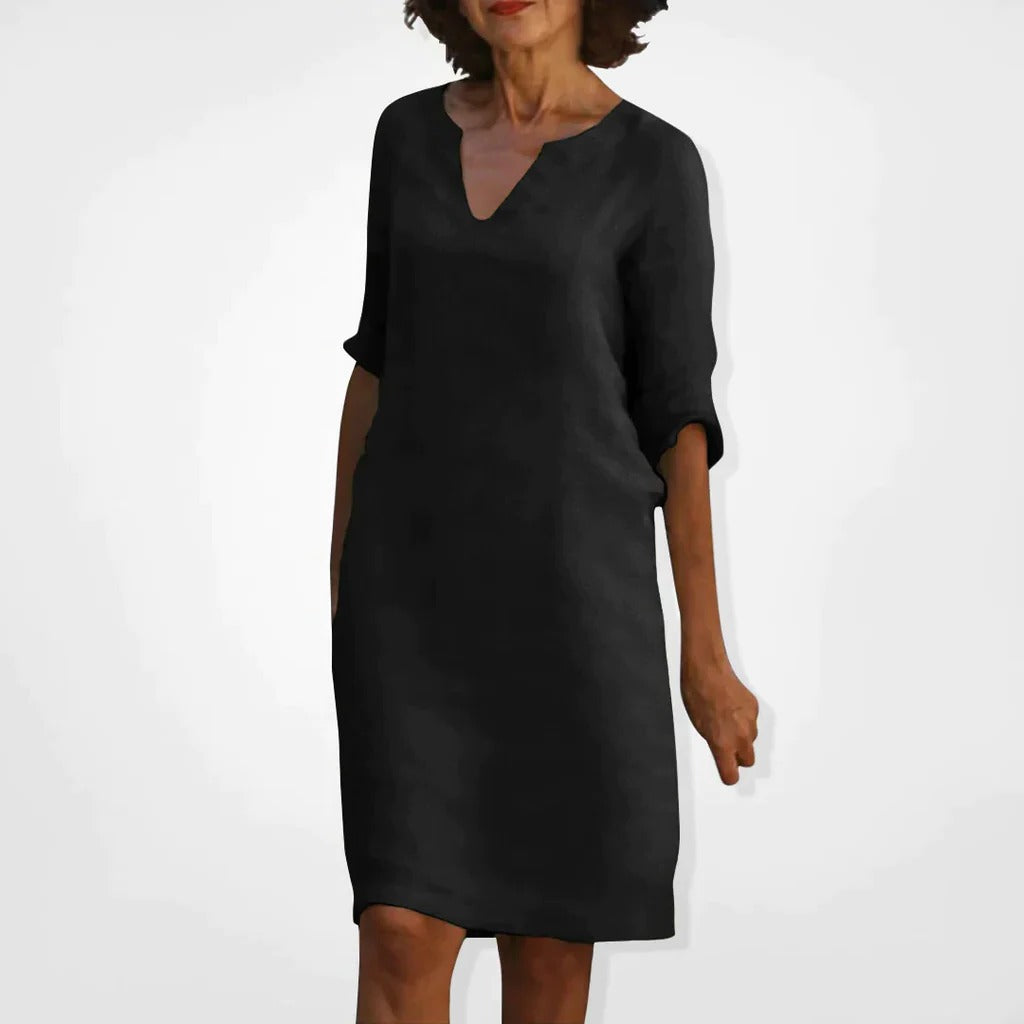 Belro summer dress with V-neck, lightweight fabric, sleeveless design, and floral pattern perfect for warm weather.