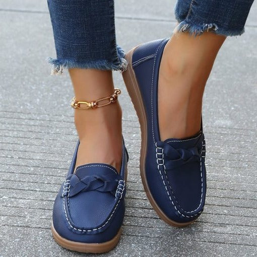 Belro women's soft leather slip-on loafers, comfortable walking footwear, with sleek design and cushioned insole.
