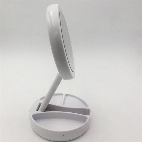 Belro LED folding vanity mirror with built-in lights, compact makeup mirror for health and beauty use.