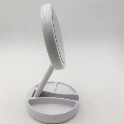 Belro LED folding vanity mirror with built-in lights, compact makeup mirror for health and beauty use.