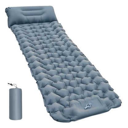 Belro ultralight and compact sleeping pad for outdoor camping, shown rolled out on a grassy surface.
