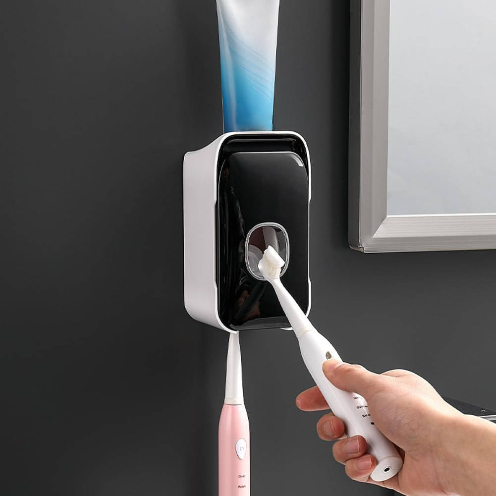Wall-mounted Belro automatic toothpaste dispenser in white with a sleek design for easy, hygienic oral care.