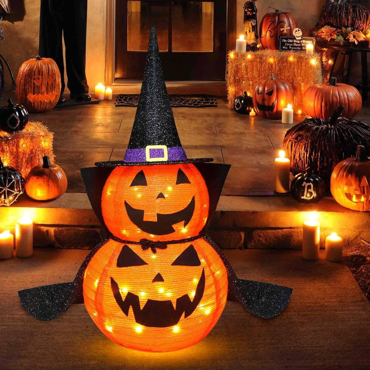 Two 3ft collapsible LED Halloween pumpkin garden decorations by Belro, suitable for indoor and outdoor holiday decor.