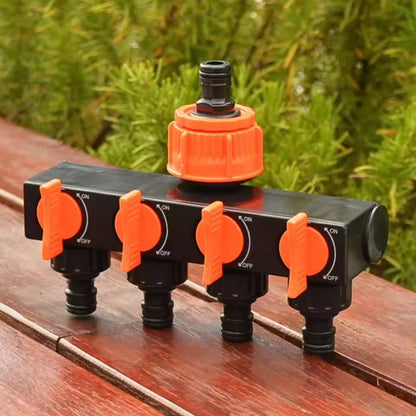 Belro 4-way garden hose splitter showing four outlets attached to a garden hose for outdoor watering.