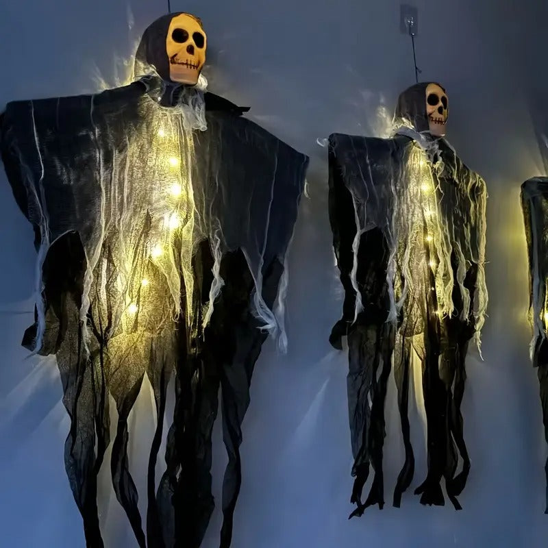 Set of two glowing skulls outdoor Halloween decorations by Belro, featuring eerie skulls with glowing eyes for spooky outdoor display