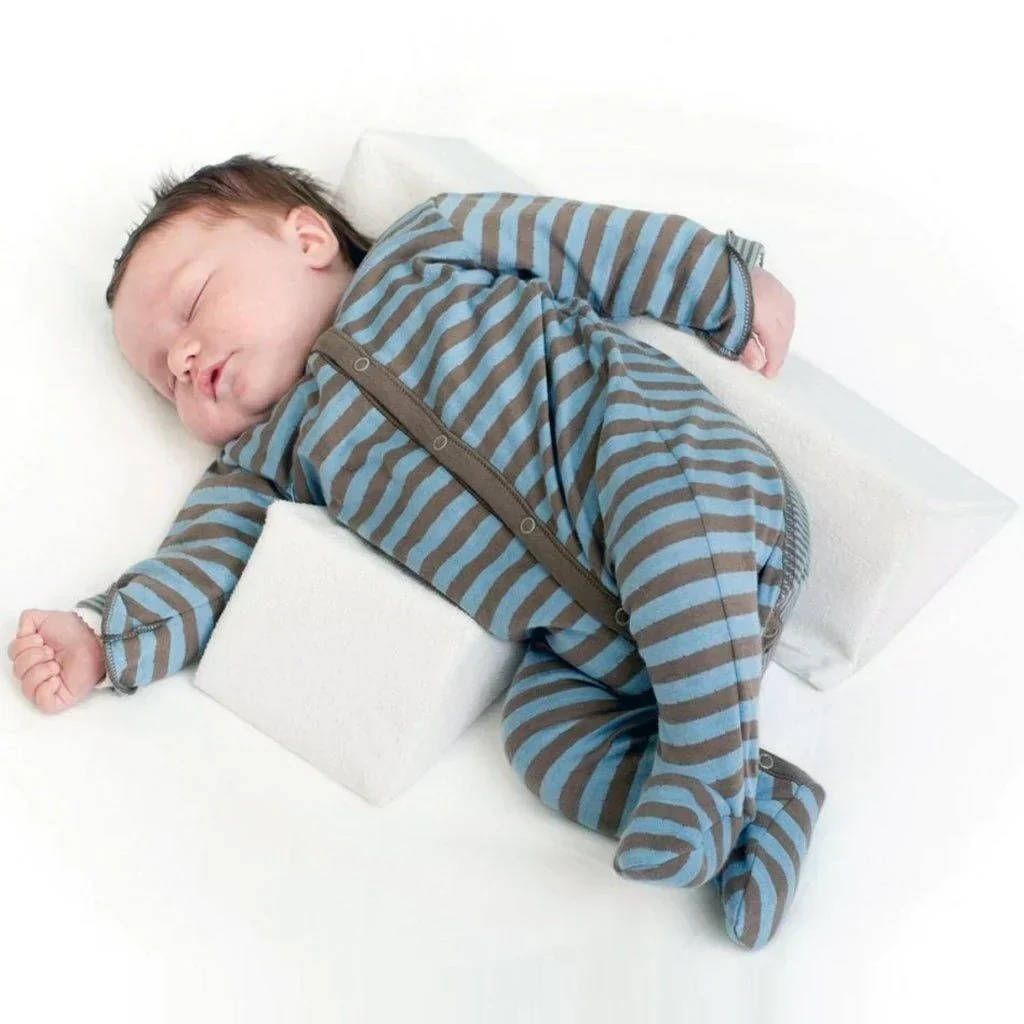 Belro newborn side sleeper wedge pillow, designed for safe infant positioning in home and bedding settings.