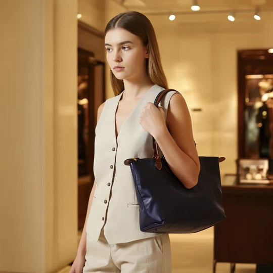 Belro women's handbag with sleek design and multiple compartments, shown in a close-up view.