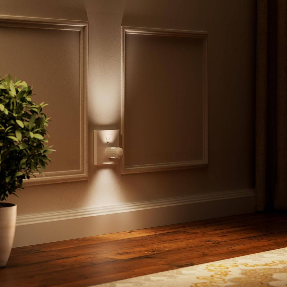 Belro wall socket light mounted on a wall, compact electronics device with a sleek design and illuminated indicator.