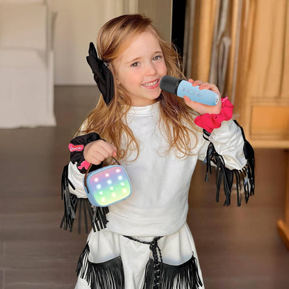Mini Belro karaoke machine with two wireless microphones, compact toy for singing and entertainment.