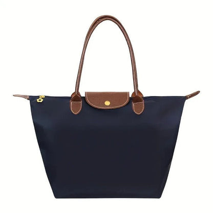 Belro Aimee women's handbag showcasing a sleek, stylish design with textured leather and gold-tone hardware.