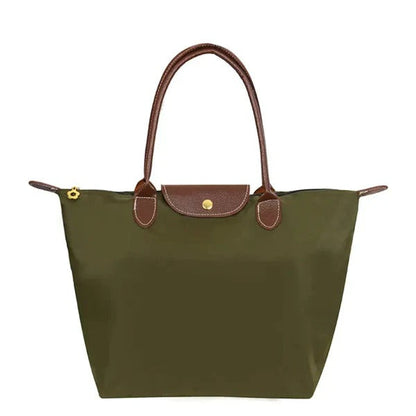 Belro Aimee women's handbag with a sleek design, featuring a textured surface and elegant gold-tone hardware.