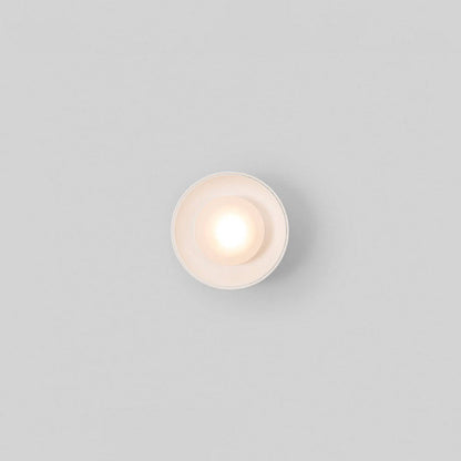 Modern black Nordic wall lamp by Belro installed outdoors, designed for stylish outdoor lighting in home and garden settings.