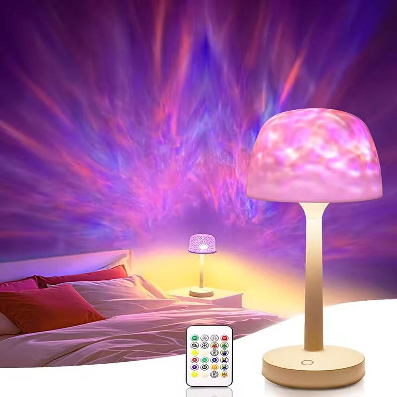 Belro cordless room light projector lamp illuminating a bedroom wall with colorful star and moon patterns.