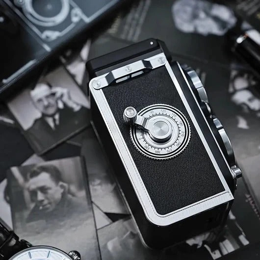Vintage Belro digital camera with retro design, black body, lens, and controls, used for photography and digital imaging.