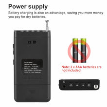 Belro portable pocket AM/FM radio showing tuning dial and speaker, compact electronic audio device for on-the-go listening