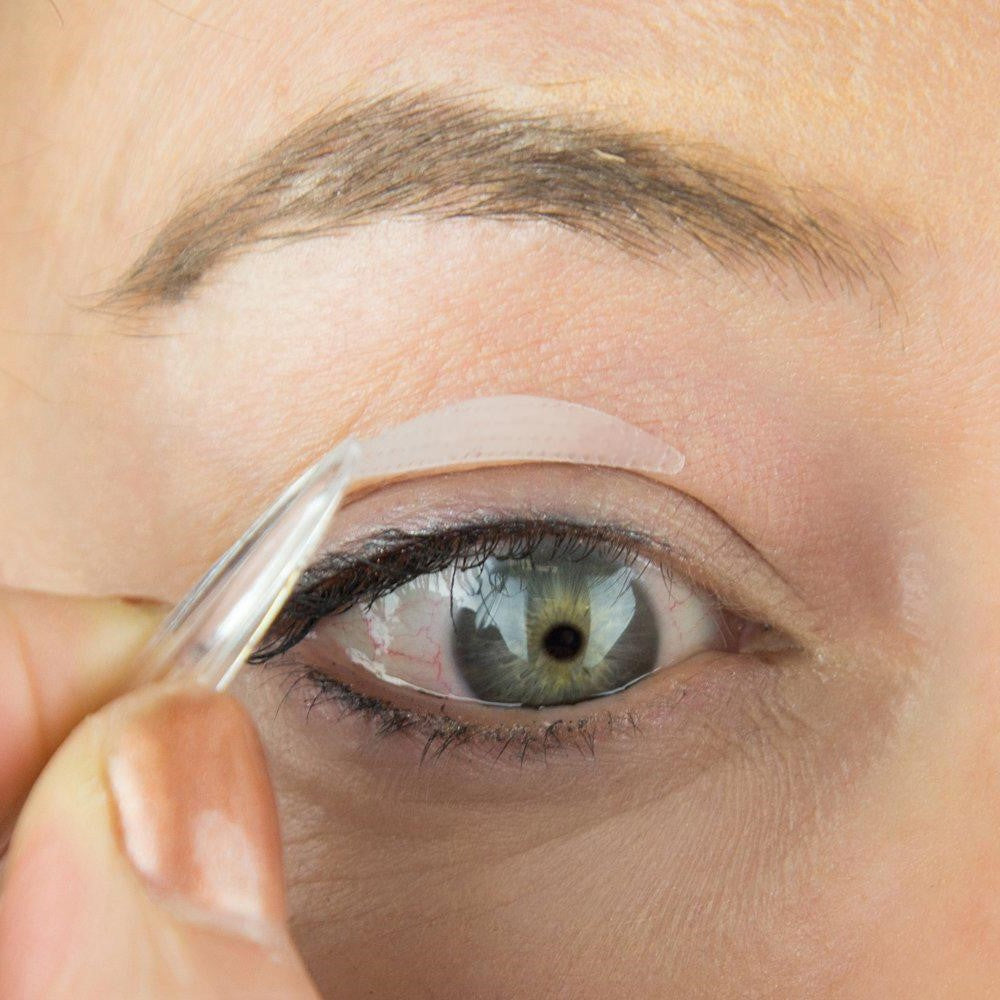 Belro anti-aging eyelid tape strips, designed to lift and tighten eyelids, shown in a close-up image of the product packaging.