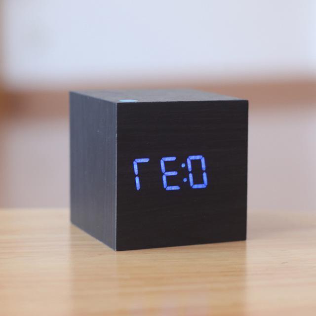 Black and blue modern digital wood clock by Belro, suitable for home and garden desks, with a sleek contemporary design.