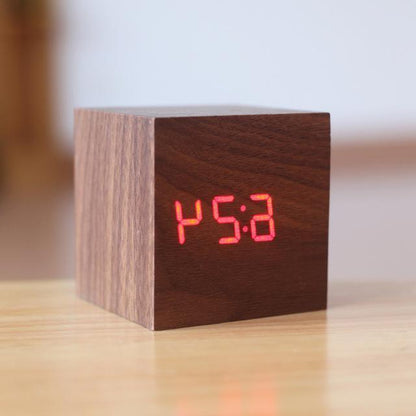 Modern digital wood clock by Belro with a walnut and orange finish, designed for home and garden desks.