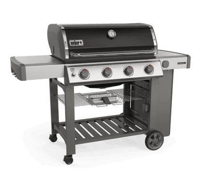 Casavibeo Weber Genesis II E-410 NGs gas grill with four burners, stainless steel construction, and side shelves.