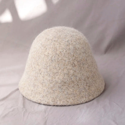 Khaki women's winter wool bucket hat by Belro, stylish accessory with a cozy, warm design for cold weather.