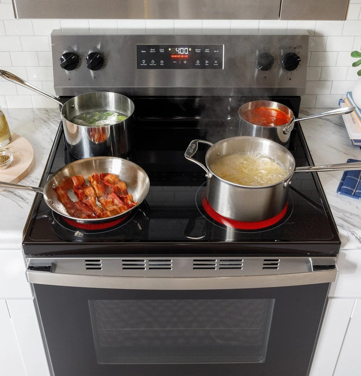 Casavibeo 30-inch freestanding electric range with four burners and digital control panel, stainless steel finish.