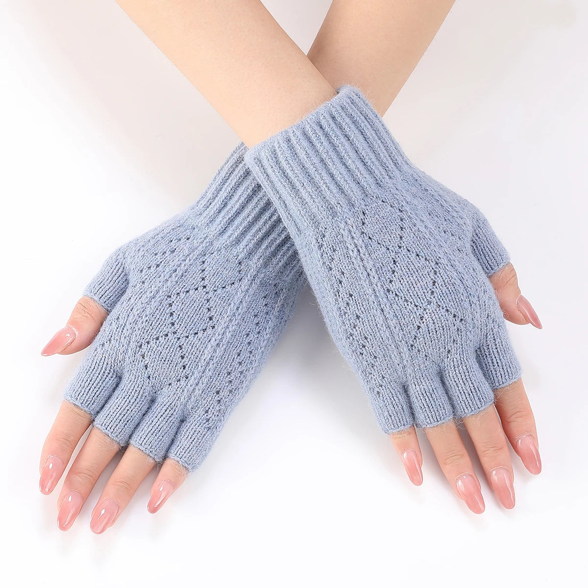 Light blue soft knit fingerless gloves by Belro, winter accessories, showing the cozy, textured fabric and open finger design.