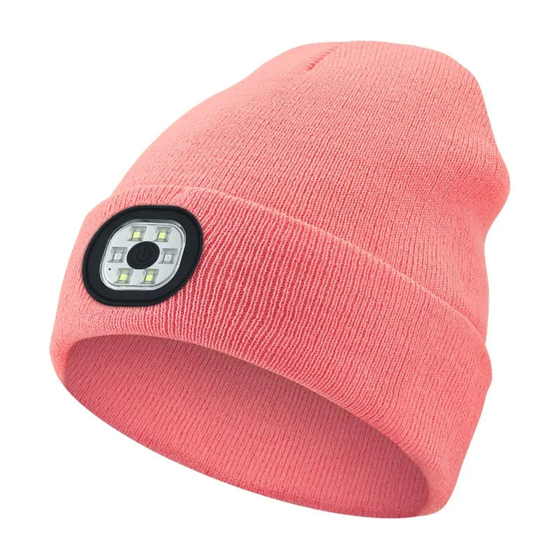 Light pink Belro rechargeable LED beanie hat for winter with built-in flashlight and lighting, perfect for cold weather activities.