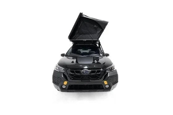 Casavibeo Odyssey V2 Standard Hard Shell Rooftop Tent mounted on a vehicle, showcasing its durable hard shell design and compact structure.