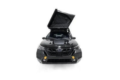 Casavibeo Odyssey V2 Standard Hard Shell Rooftop Tent mounted on a vehicle with open windows, showcasing its durable design and compact setup.