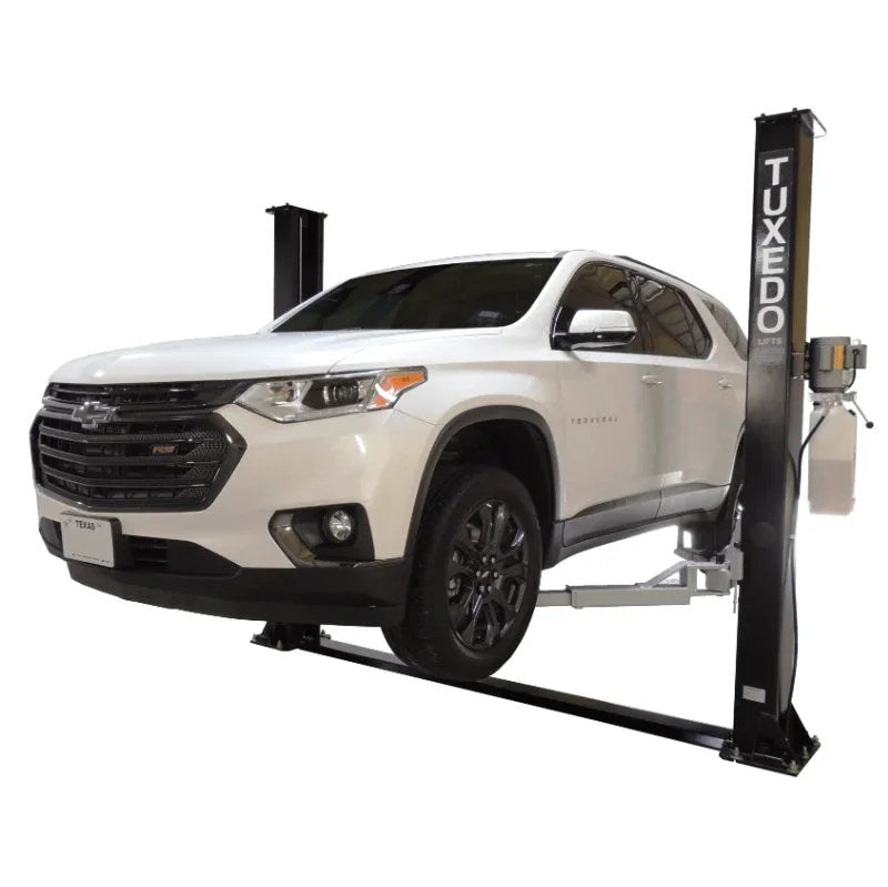 Casavibeo TP9KF TUX 9,000lb 2-post symmetric car lift with sturdy steel arms and safety locks in a garage setting
