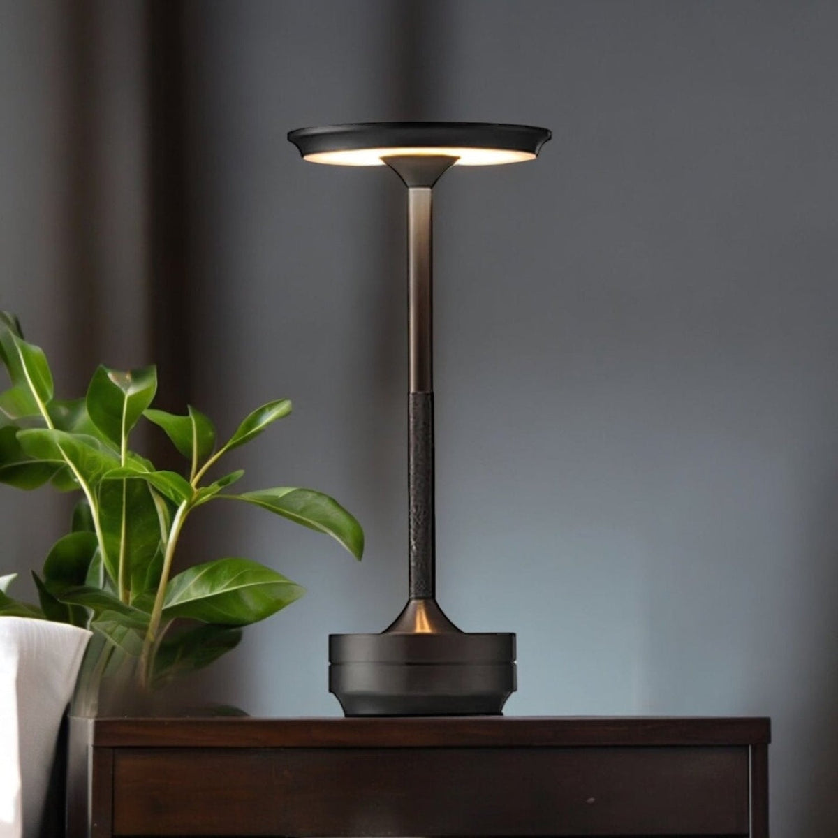 Belro cable-free rechargeable modern aura table lamp with sleek design and soft glowing light, ideal for ambient nighttime lighting.