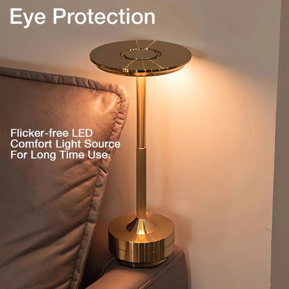 Modern Aura Table Lamp by Belro, rechargeable and cable-free, illuminated with a sleek, minimalist design for modern lighting.