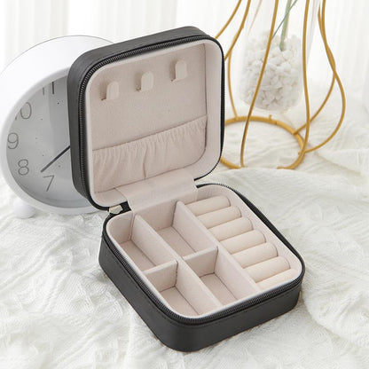 Belro travel jewelry case with multiple compartments, compact design, and secure closure for organizing jewelry accessories.