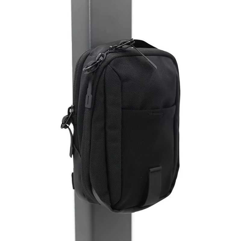 Belro magnetic water bottle gym bag inside a duffel bag, showing its practical design for fitness and travel storage.