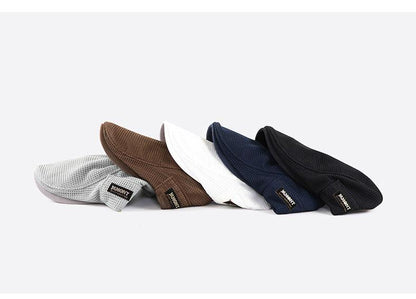 Men's flat cap by Mivoza Deutschland featuring breathable mesh ventilation and adjustable fit, made of cotton for casual wear.