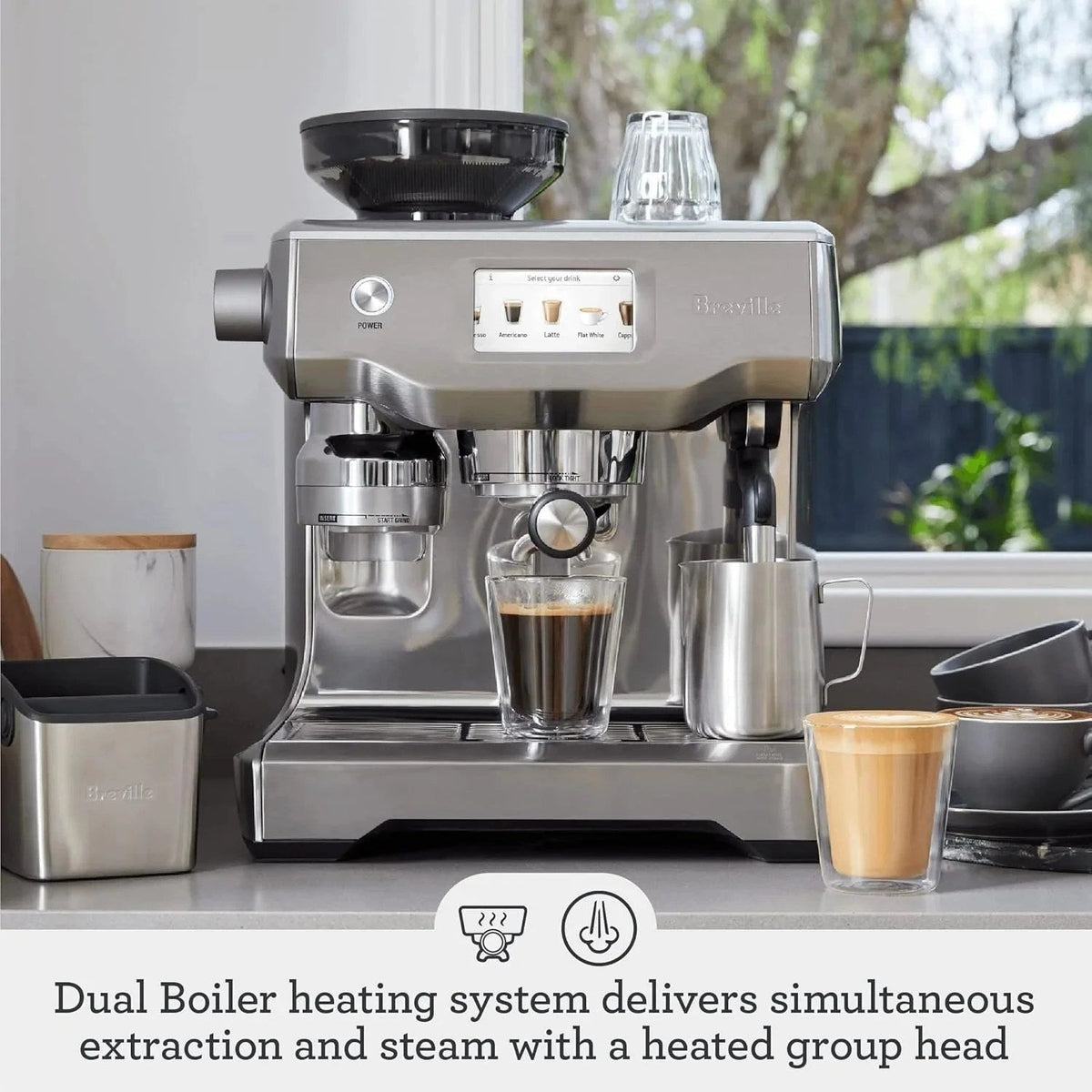 Casavibeo Breville Oracle Touch espresso machine with stainless steel finish and digital touch interface.
