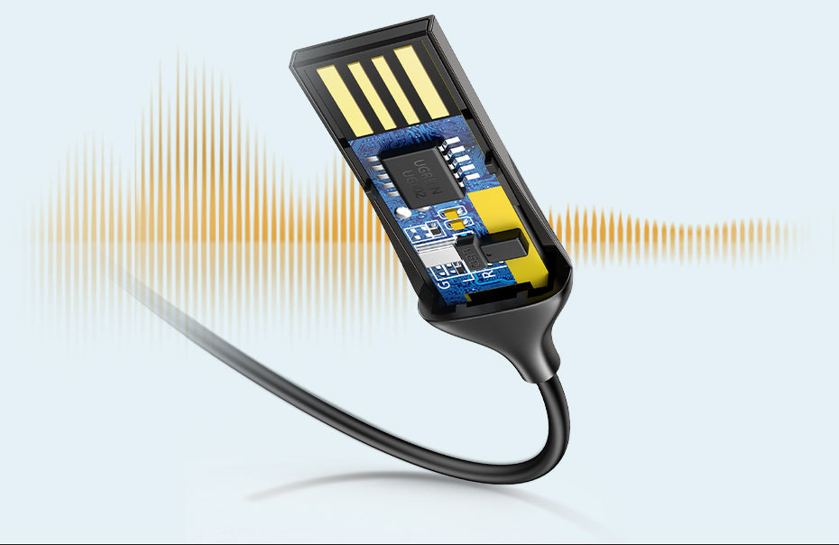 Belro Bluetooth Aux Adapter connected to audio device, compact electronic accessory for wireless audio streaming.