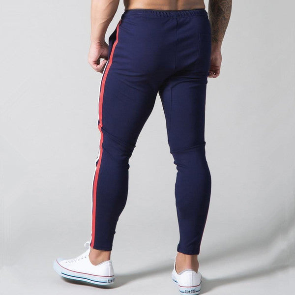 Belro slim-fit banded joggers in soft fabric, shown folded with elastic waistband and tapered legs for a comfortable fit.