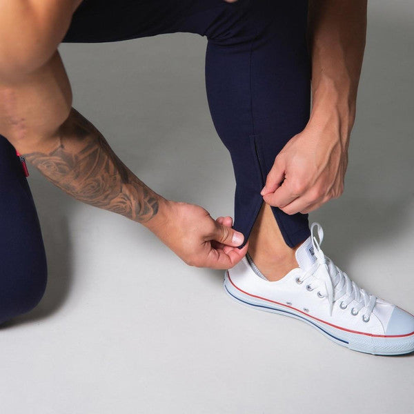 Belro slim-fit banded joggers in black, showing the tapered leg design and comfortable waistband on a neutral background.