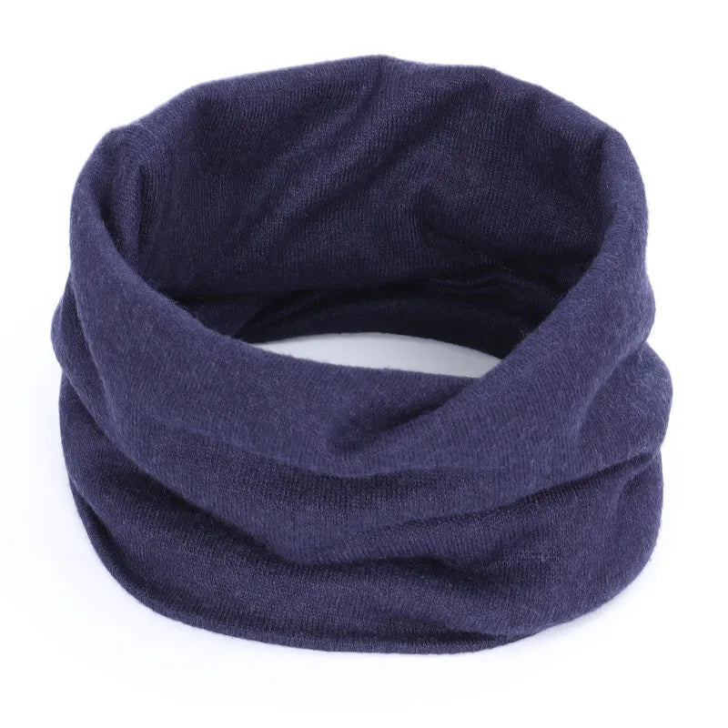 Navy blue cozy cashmere winter scarf and neck warmer by Belro, made from soft, warm cashmere for cold weather comfort.