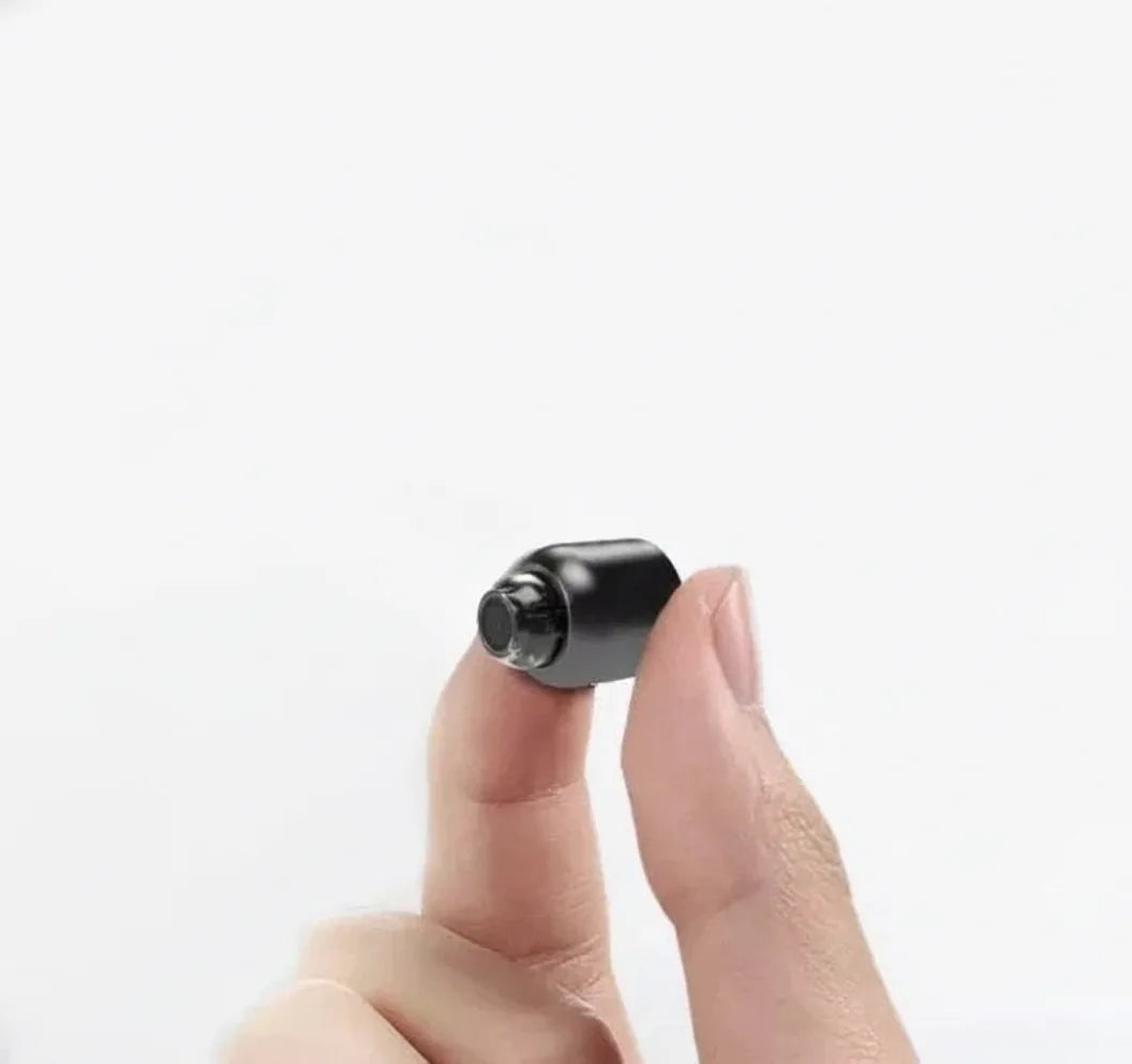 Mivoza Mini WiFi Security Camera showing black cube with lens, night vision LEDs, and compact design for home surveillance.