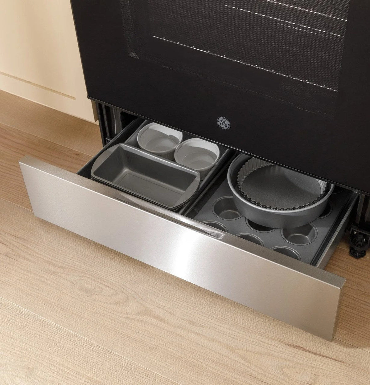 Casavibeo GE 30-inch freestanding electric range with four burners and digital control panel, stainless steel finish.