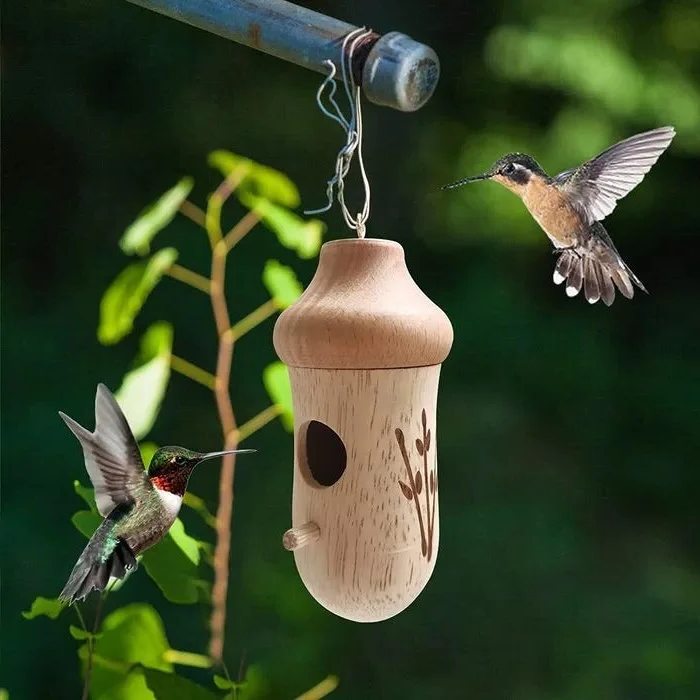 Wooden hummingbird house by Belro, crafted for natural lovers, suitable for garden decor and birdwatching enthusiasts.