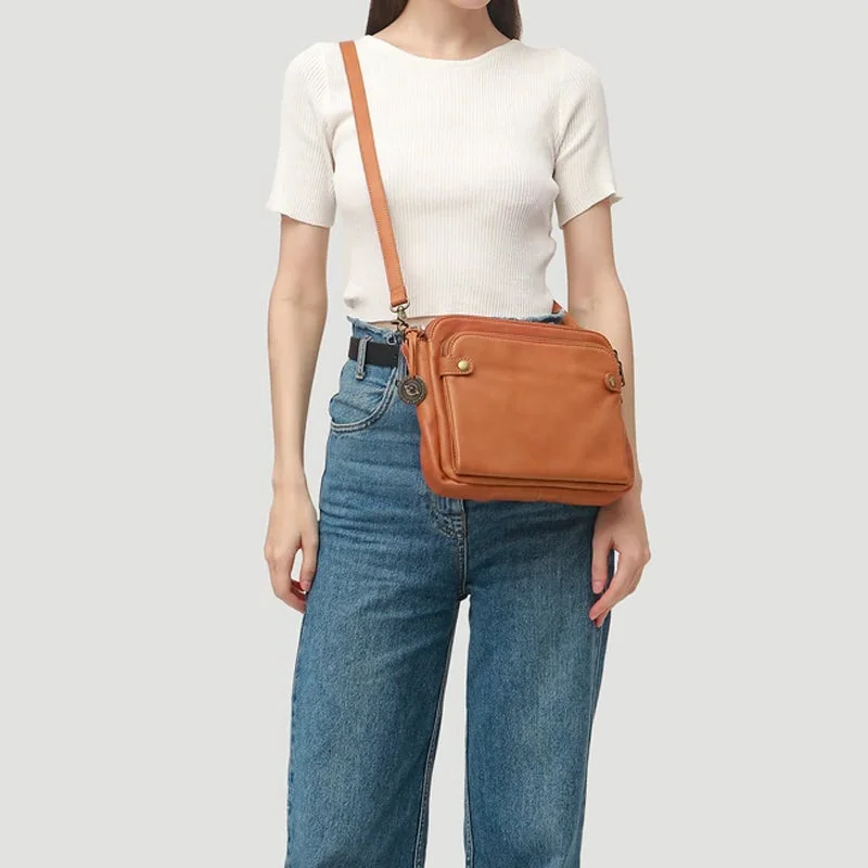Belro three-layer leather crossbody bag and clutch with adjustable strap and multiple compartments, stylish accessories for everyday use.