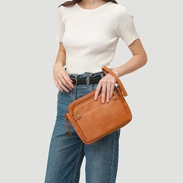 Belro three-layer leather crossbody bag and clutch with adjustable strap and multiple compartments for stylish organization.