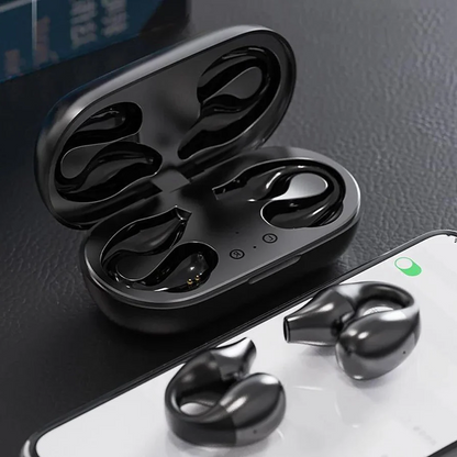 Belro wireless ear clip bone conduction headphones with black design, showing the ear hooks and open-ear audio setup.
